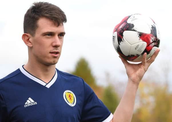 Ryan Jack models the new Scotland home kit. Picture: Ross Parker/SNS