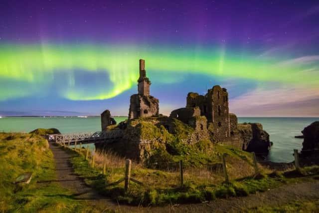 Amazing northern lights display over Sinclair & Girnigoe Castle in Caithness, Scotland. Picture: SWNS