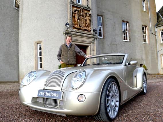 North East 250 developer Guy Macpherson-Grant launches the route with a Morgan Aero 8 at Ballindalloch Castle. Picture: North East 250
