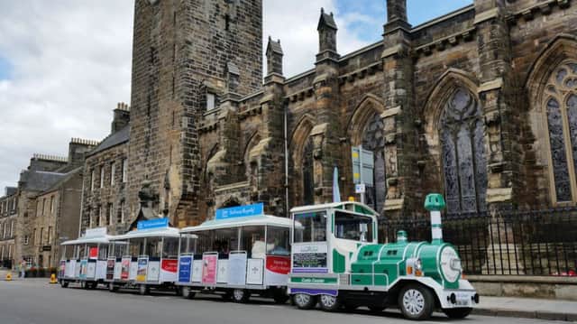 Land trains similar to this one could be seen on Edinburgh's Royal Mile