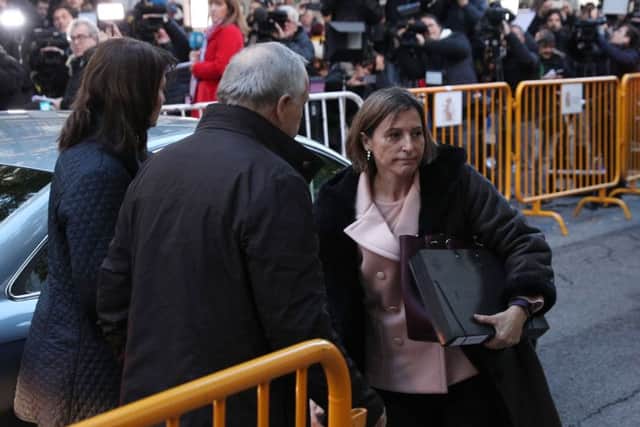 Former speaker of Catalonia's sacked parliament Carme Forcadell (right) arrives at the Supreme Court in Madrid, AFP PHOTO / STRSTR/AFP/Getty Images