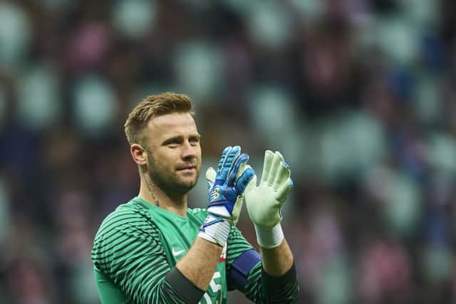Artur Boruc applauds the Polish fans in his final appearance for the national team. Picture: Adam Nurkiewicz/Getty Images