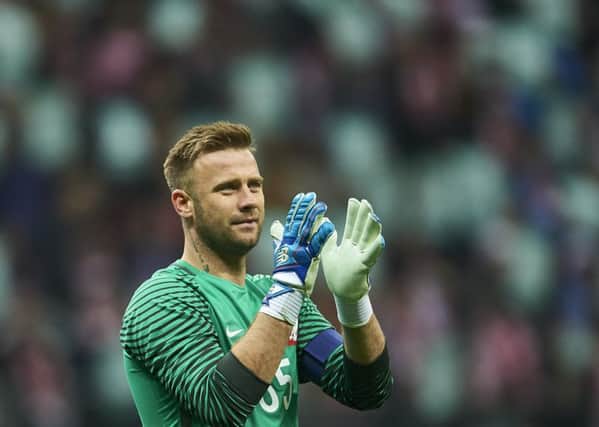Artur Boruc applauds the Polish fans in his final appearance for the national team. Picture: Adam Nurkiewicz/Getty Images