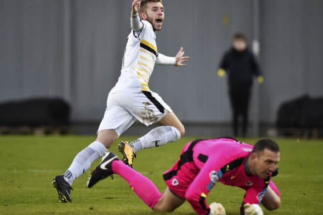 Dumbarton's Alistair Roy celebrates after scoring to make it 2-0. Picture: SNS/Rob Casey