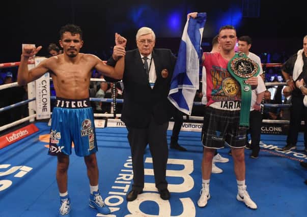 Josh Taylor (right) celebrates his win over Mexico's Miguel Vazquez to retain the WBC Super Lightweight title. Picture: Paul Devlin/SNS