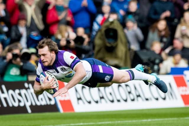 Stuart Hogg dives over to score Scotland's first try after just 90 seconds of the opening autumn Test against Samoa at BT Murrayfield. Picture: SNS