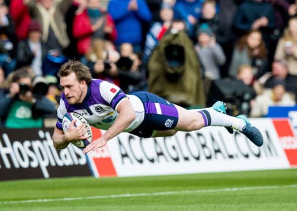 Stuart Hogg dives over to score Scotland's first try after just 90 seconds of the opening autumn Test against Samoa at BT Murrayfield. Picture: SNS