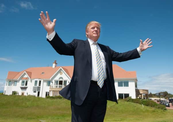 Donald Trump outside Trump Turnberry's clubhouse.