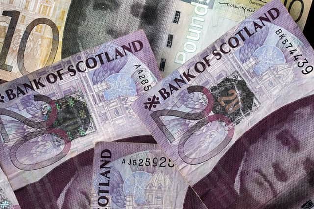 An arrangement of Scottish pound sterling banknotes. A Tory MP says a more diverse figure should feature. Picture: Andy Buchanan/AFP/Getty Images