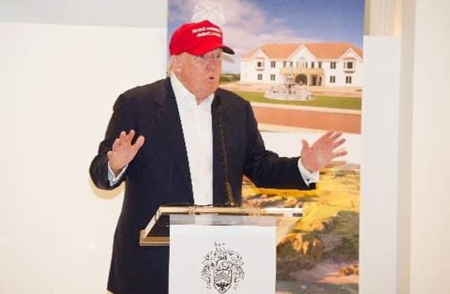 Donald Trump gives a speech at the Turnberry hotel and golf resort in Ayrshire, which he bought in 2014. Picture: John Devlin/TSPL