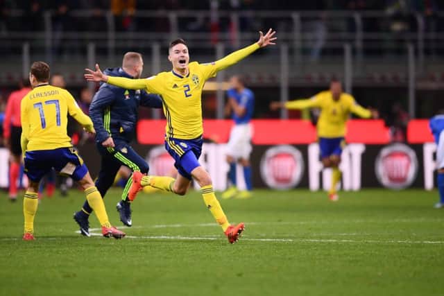 Mikael Lustig leads the celebrations after Sweden qualified thanks to a 1-0 aggregate victory. Picture: AFP/Getty Images