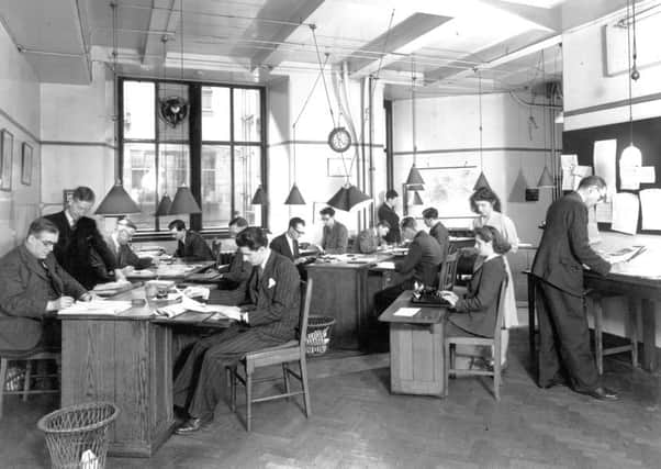 Journalists at work in The Scotsman newspaper's editorial department, North Bridge, Edinburgh, around 1948