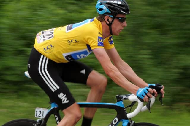 Sir Bradley Wiggins riding in the leaders jersey during the 2011 Criterium du Dauphine race when the mysterious parcel was delivered. Picture: Pascal Pavani/AFP/Getty