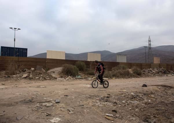 Cards Against Humanity have bought land on the US Mexico Border. Picture: GUILLERMO ARIAS/AFP/Getty Images