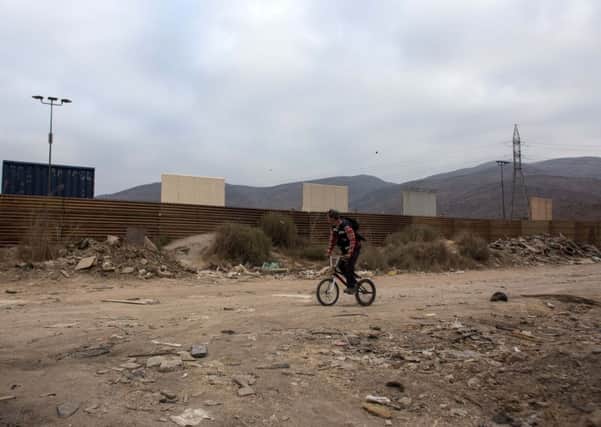 Cards Against Humanity have bought land on the US Mexico Border. Picture: GUILLERMO ARIAS/AFP/Getty Images