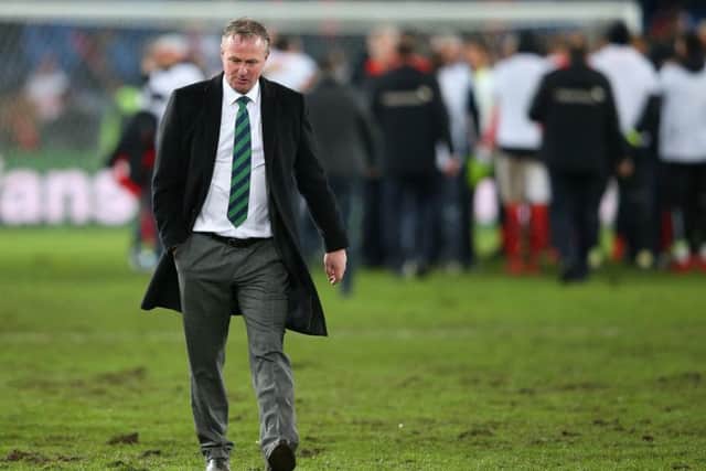Michael O'Neill walks off the field after Northern Ireland's exit from the World Cup play-offs. Picture: Getty