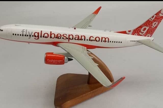A wooden model of a FlyGlobespan-liveried plane is on sale from the Philippines.