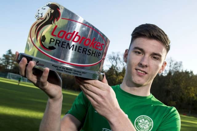 Kieran Tierney is presented with the Ladbrokes Premiership Player of the Month award for October. Picture: SNS Group