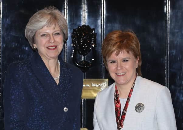 Theresa May and Nicola Sturgeon have issued messages to mark St Andrew's Day. Picture: Getty