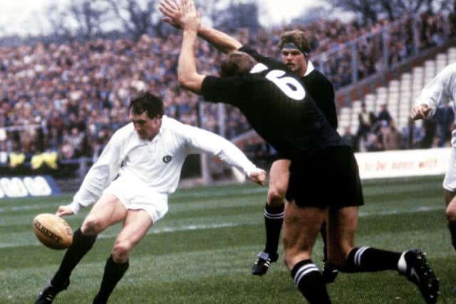 Scotland's Peter Dods, left, clears the ball as New Zealand's Mark Shaw closes in during the Test natch in 1983. Picture: SNS