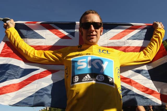 Sir Bradley Wiggins celebrates his Tour deFrance victory. Picture: Bryn Lennon/Getty Images