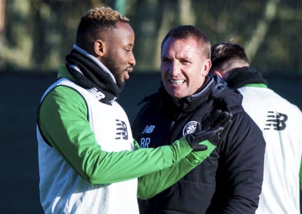 Celtic manager Brendan Rodgers, right, with Moussa Dembele. Picture: SNS
