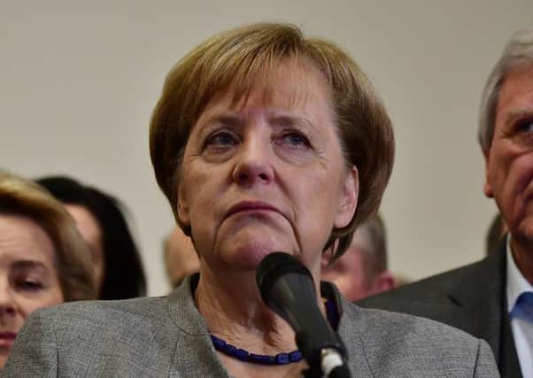 German Chancellor Angela Merkel says her pre-election pledge to serve another full term stands and she is ready to run again. Picture: Getty
