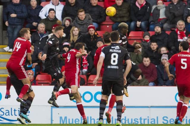 Motherwell's Louis Moult scores to make it 1-0. Picture: SNS/Craig Foy