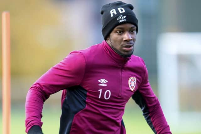 Arnaud Djoum cannot wait to get back on the Tynecastle turf to help his team. Picture: Bill Murray/SNS