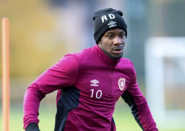 Arnaud Djoum cannot wait to get back on the Tynecastle turf to help his team. Picture: Bill Murray/SNS