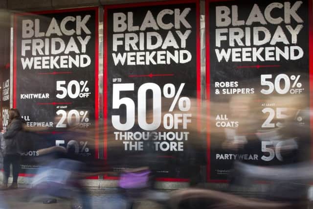 Scots are tipped to spend less than last year in the Black Friday sales. Picture: JUSTIN TALLIS/AFP/Getty Images