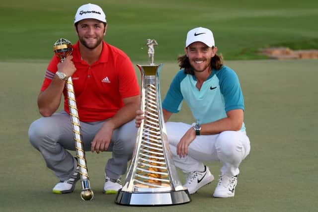 Tournament champion Jon Rahm and Tommy Fleetwood, the Race to Dubai winner, at Jumeirah Golf Estates. Picture: Getty
