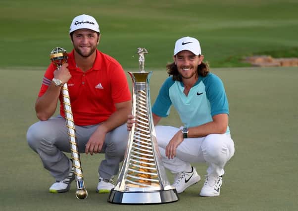 Tournament champion Jon Rahm and Tommy Fleetwood, the Race to Dubai winner, at Jumeirah Golf Estates. Picture: Getty