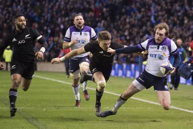 Scotland's Stuart Hogg is denied in the closing seconds by a try-saving tackle from Beauden Barrett. Picture: SNS/SRU