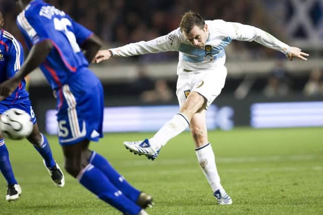 McFadden lines up the shot that gave Scotland a 1-0 win over France at the Parc des Princes. Picture: SNS.