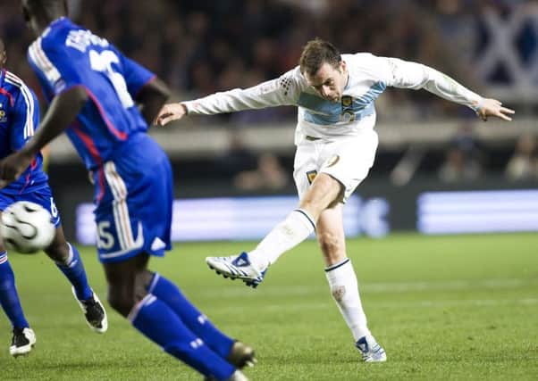 McFadden lines up the shot that gave Scotland a 1-0 win over France at the Parc des Princes. Picture: SNS.