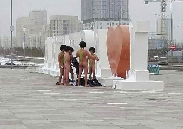 Czech tourists dressed in swimsuits similar to the character made famous by TV and film character Borat in Astana. Picture: informburo.kz, via AP