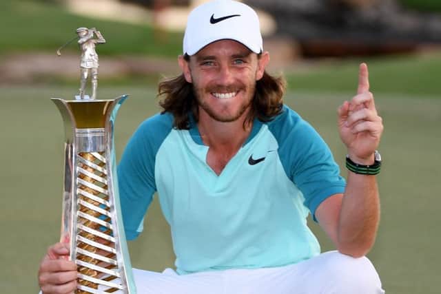 Tommy Fleetwood poses with the Race to Dubai trophy. Picture: Getty