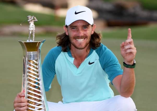 Tommy Fleetwood poses with the Race to Dubai trophy. Picture: Getty