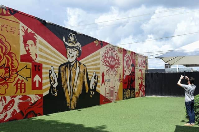 A mural by Shepard Fairey in Wynwood. Photographs: Rhona Wise/AFP/Getty Images