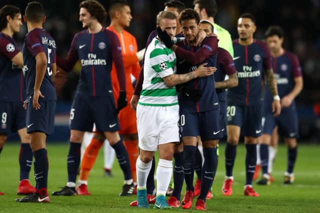 Celtic's Leigh Griffiths is consoled by Neymar after PSG's 7-1 Champions League win at Parc des Princes. Picture: Catherine Ivill/Getty Images