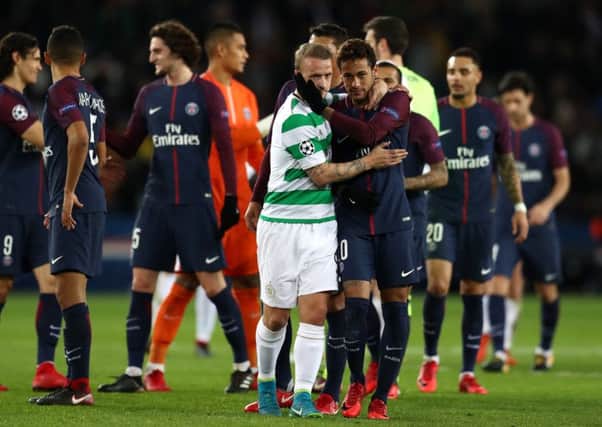 Celtic's Leigh Griffiths is consoled by Neymar after PSG's 7-1 Champions League win at Parc des Princes. Picture: Catherine Ivill/Getty Images