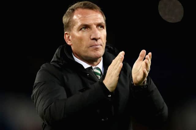 Brendan Rodgers salutes the travelling Celtic fans after the 7-1 thrashing in Paris. Picture: Getty Images