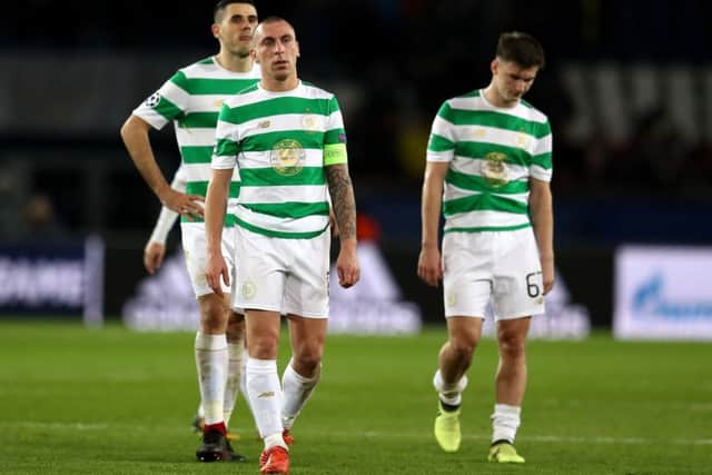 Scott Brown cuts a dejected figure at the full time whistle. Picture: Getty Images