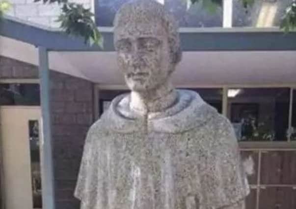 The statue at Blackfriars Priory School has now been covered up