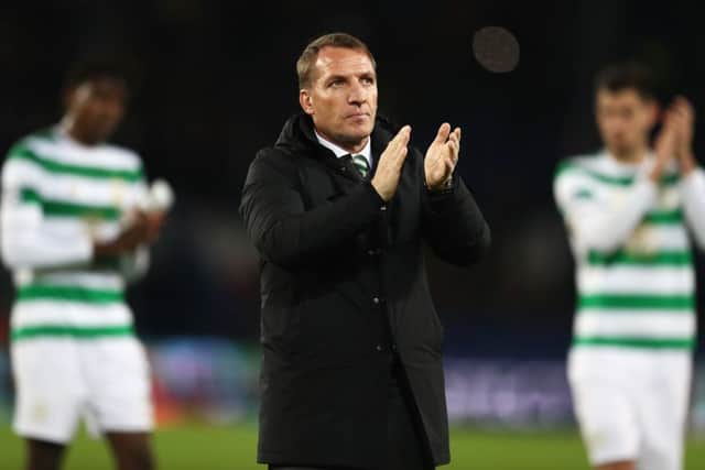 Brendan Rodgers applauds the travelling support after the Group B match between Paris Saint-Germain and Celtic at the Parc des Princes in Paris. Picture: Getty Images