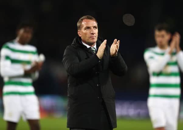 Brendan Rodgers applauds the travelling support after the Group B match between Paris Saint-Germain and Celtic at the Parc des Princes in Paris. Picture: Getty Images
