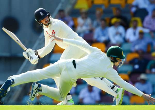 Australia fielder Cameron Bancroft dives for a shot by England batsman James Vince. Picture: Patrick Hamilton/AFP/Getty Images