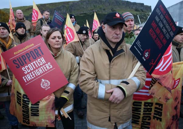 Firefighters listen to Scottish Labour leader Richard Leonard during a protest outside the Scottish Parliament (Picture: PA)