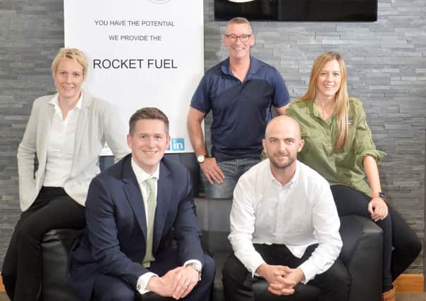 Moonshot and Harper Macleod launched their partnership at the law firms Edinburgh office, with (from left) Jo Nisbet, Martin Darroch, Jim Duffy, Al Walker and Sharon Mars. Photograph: Julie Howden